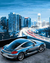 Автомобиль с видом на большой ночной город